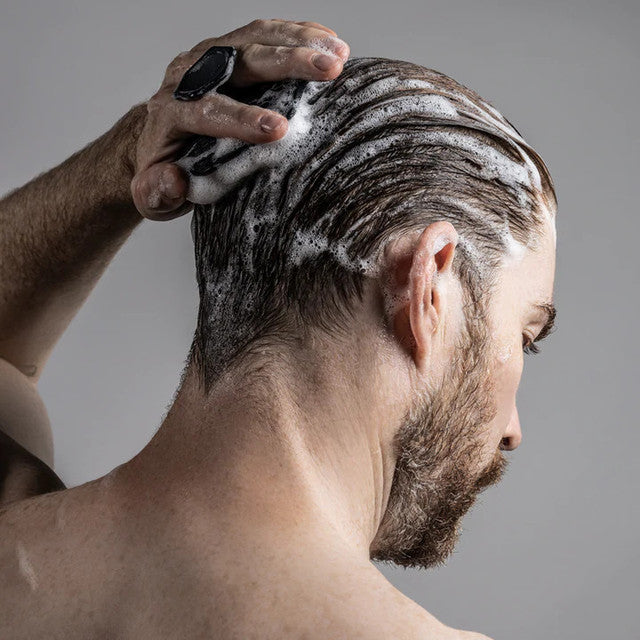 Tooletries Scalp Massager and Hook in use