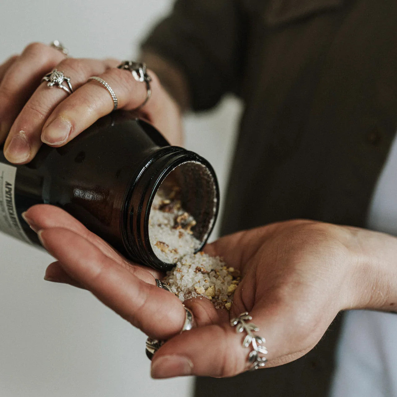 Opened jar of apothecary 87 bath salts